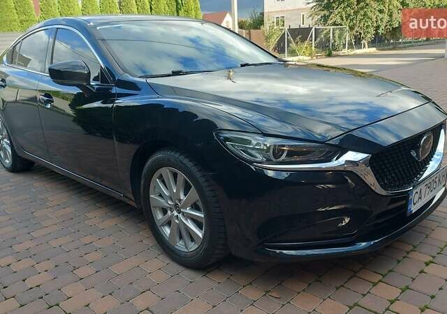 Чорний Мазда 6, об'ємом двигуна 2.49 л та пробігом 60 тис. км за 19900 $, фото 1 на Automoto.ua