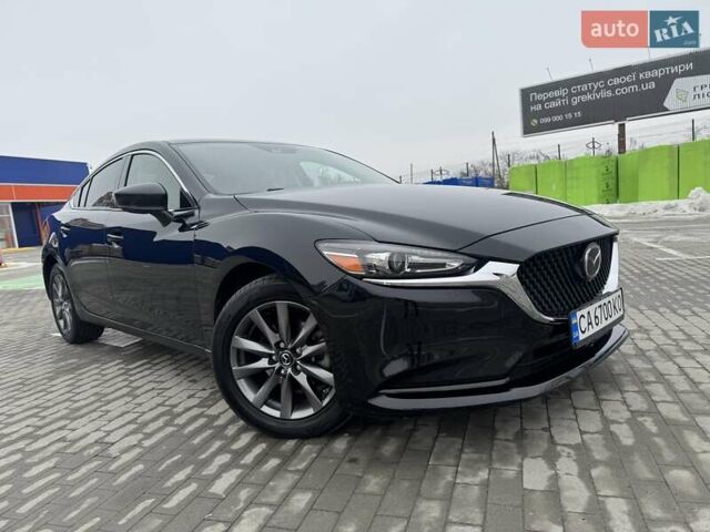 Черный Мазда 6, объемом двигателя 2.5 л и пробегом 166 тыс. км за 14800 $, фото 1 на Automoto.ua