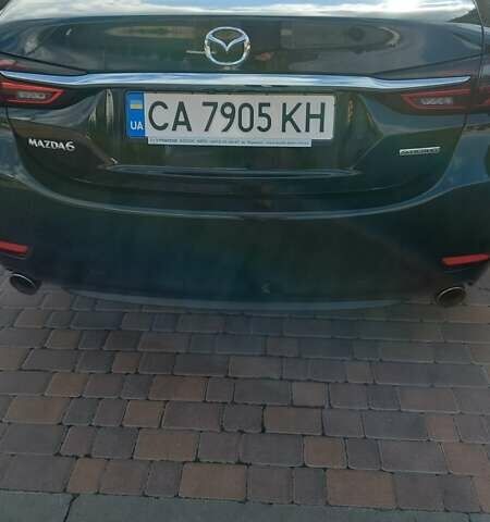 Чорний Мазда 6, об'ємом двигуна 2.49 л та пробігом 60 тис. км за 19900 $, фото 4 на Automoto.ua