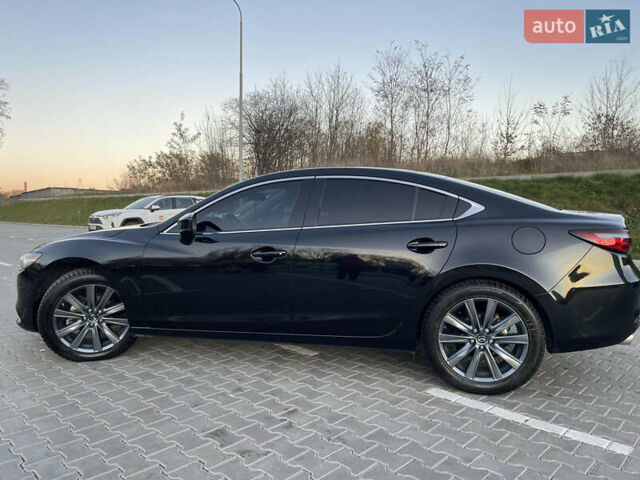 Черный Мазда 6, объемом двигателя 2.5 л и пробегом 125 тыс. км за 18050 $, фото 7 на Automoto.ua