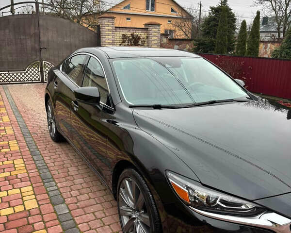 Черный Мазда 6, объемом двигателя 2.49 л и пробегом 19 тыс. км за 19500 $, фото 1 на Automoto.ua