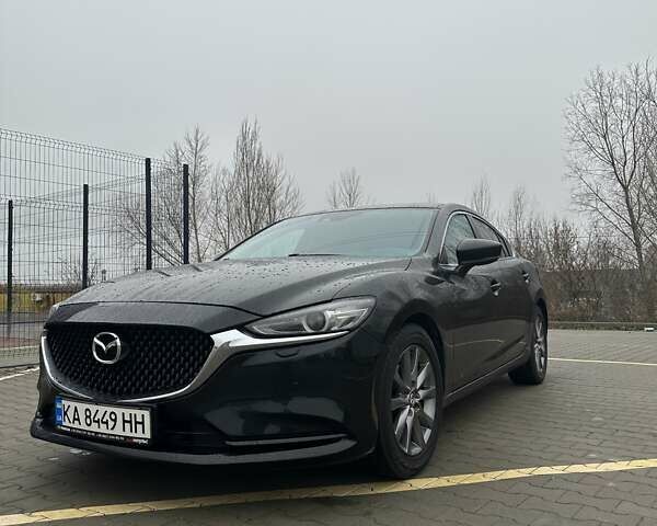 Черный Мазда 6, объемом двигателя 2 л и пробегом 103 тыс. км за 23100 $, фото 1 на Automoto.ua
