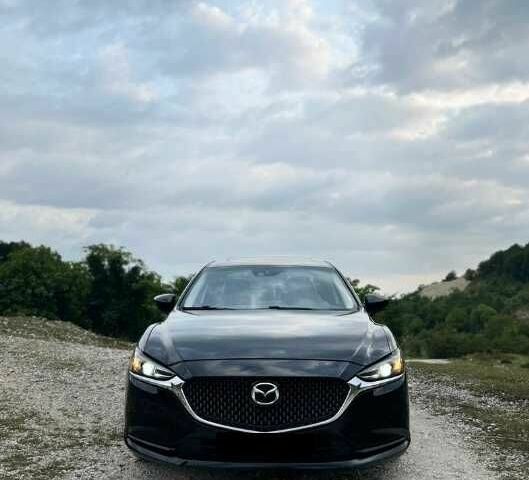 Черный Мазда 6, объемом двигателя 2.5 л и пробегом 116 тыс. км за 12550 $, фото 1 на Automoto.ua