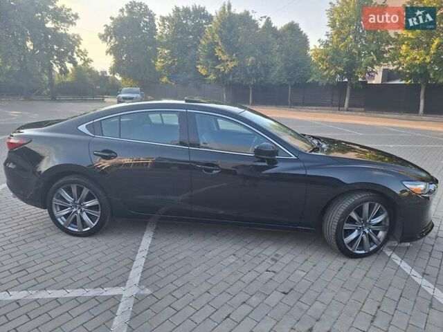 Черный Мазда 6, объемом двигателя 2.5 л и пробегом 96 тыс. км за 18900 $, фото 12 на Automoto.ua