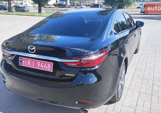 Черный Мазда 6, объемом двигателя 2.49 л и пробегом 108 тыс. км за 17400 $, фото 22 на Automoto.ua