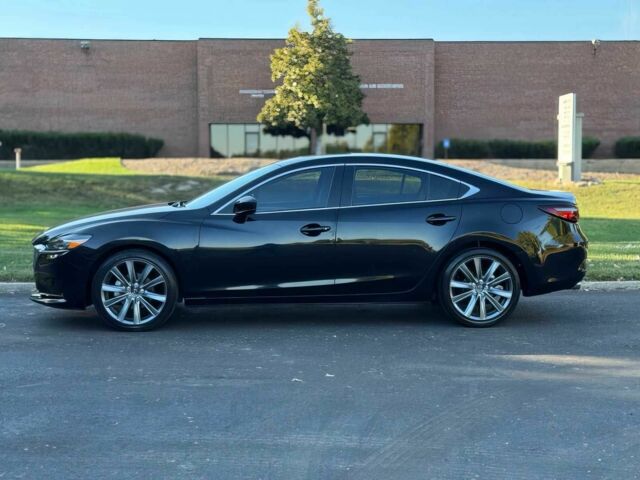 Черный Мазда 6, объемом двигателя 2.5 л и пробегом 14 тыс. км за 13200 $, фото 3 на Automoto.ua