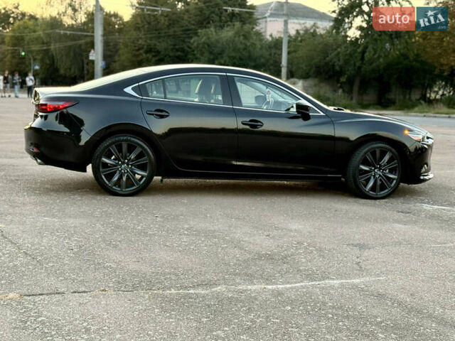 Черный Мазда 6, объемом двигателя 2.49 л и пробегом 111 тыс. км за 17900 $, фото 16 на Automoto.ua