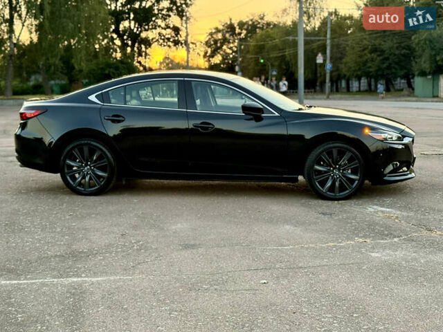 Черный Мазда 6, объемом двигателя 2.49 л и пробегом 111 тыс. км за 17900 $, фото 14 на Automoto.ua