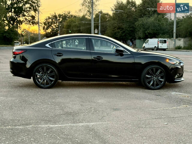 Черный Мазда 6, объемом двигателя 2.49 л и пробегом 111 тыс. км за 17900 $, фото 15 на Automoto.ua