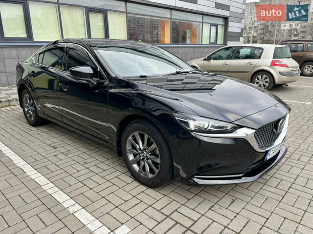 Черный Мазда 6, объемом двигателя 2.5 л и пробегом 90 тыс. км за 19888 $, фото 5 на Automoto.ua