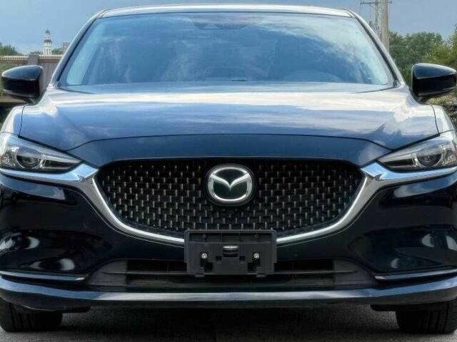 Черный Мазда 6, объемом двигателя 2.5 л и пробегом 58 тыс. км за 11700 $, фото 1 на Automoto.ua