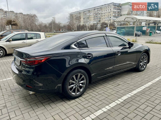 Черный Мазда 6, объемом двигателя 2.5 л и пробегом 90 тыс. км за 19888 $, фото 6 на Automoto.ua