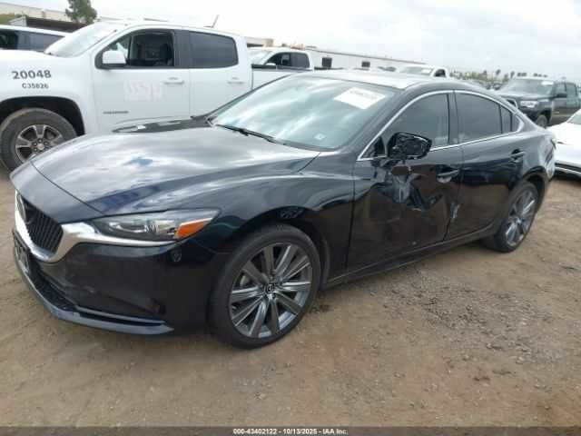 Черный Мазда 6, объемом двигателя 2.5 л и пробегом 87 тыс. км за 14000 $, фото 1 на Automoto.ua