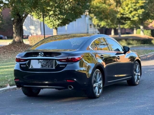 Черный Мазда 6, объемом двигателя 2.5 л и пробегом 14 тыс. км за 13200 $, фото 6 на Automoto.ua