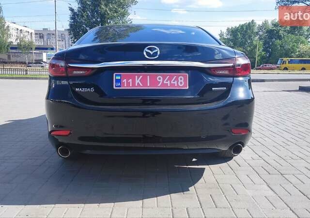 Черный Мазда 6, объемом двигателя 2.49 л и пробегом 108 тыс. км за 17400 $, фото 13 на Automoto.ua