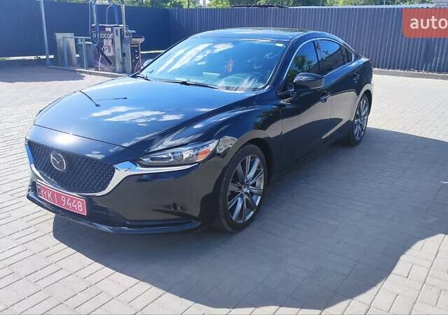 Черный Мазда 6, объемом двигателя 2.49 л и пробегом 108 тыс. км за 17400 $, фото 18 на Automoto.ua