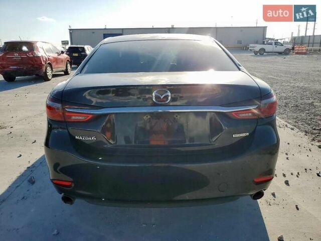 Черный Мазда 6, объемом двигателя 2.49 л и пробегом 87 тыс. км за 3000 $, фото 5 на Automoto.ua