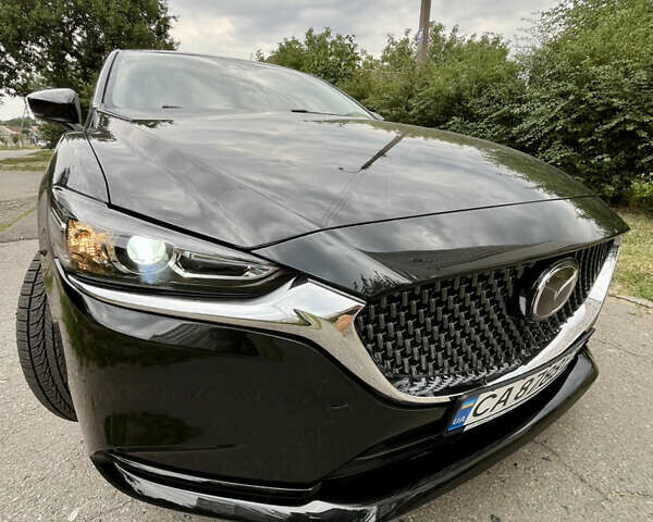 Чорний Мазда 6, об'ємом двигуна 2.5 л та пробігом 89 тис. км за 19900 $, фото 9 на Automoto.ua
