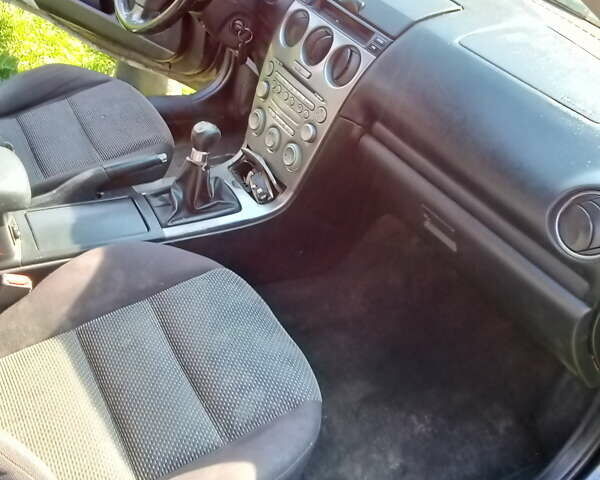 Черный Мазда 6, объемом двигателя 2 л и пробегом 249 тыс. км за 3500 $, фото 7 на Automoto.ua
