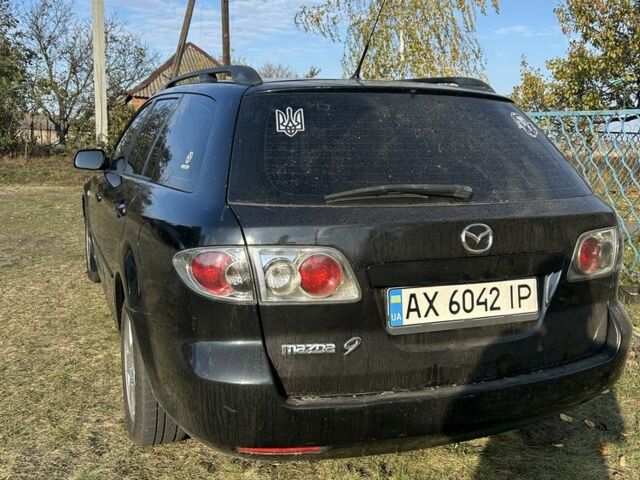 Черный Мазда 6, объемом двигателя 2 л и пробегом 342 тыс. км за 3100 $, фото 2 на Automoto.ua