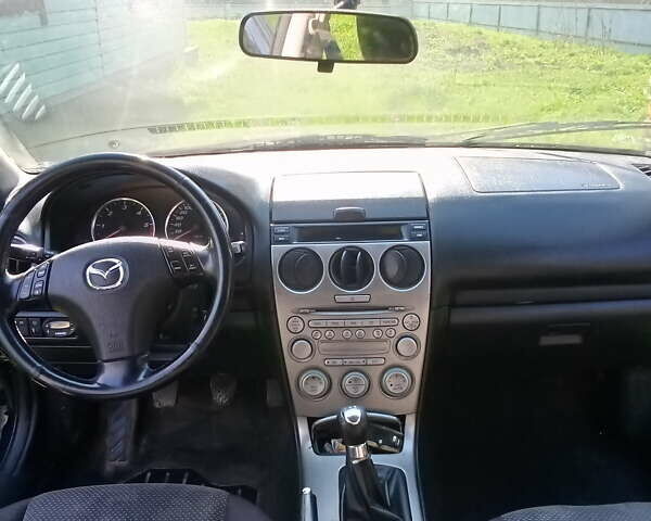 Черный Мазда 6, объемом двигателя 2 л и пробегом 249 тыс. км за 3500 $, фото 4 на Automoto.ua