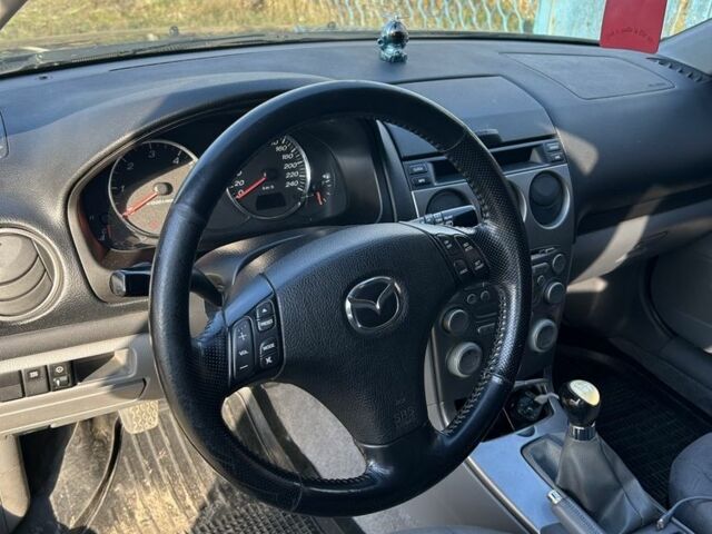 Черный Мазда 6, объемом двигателя 2 л и пробегом 342 тыс. км за 3100 $, фото 3 на Automoto.ua