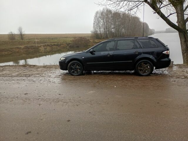 Чорний Мазда 6, об'ємом двигуна 2 л та пробігом 298 тис. км за 2000 $, фото 2 на Automoto.ua