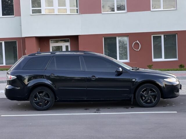 Черный Мазда 6, объемом двигателя 2 л и пробегом 296 тыс. км за 3399 $, фото 10 на Automoto.ua