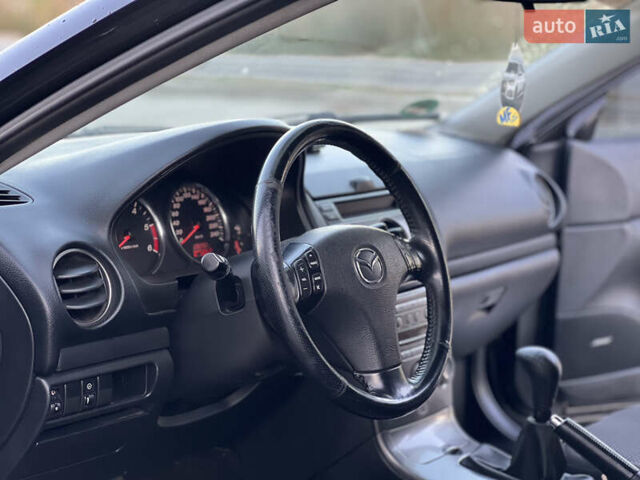 Чорний Мазда 6, об'ємом двигуна 2 л та пробігом 290 тис. км за 3200 $, фото 14 на Automoto.ua
