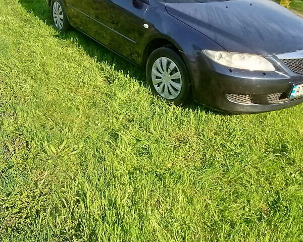 Черный Мазда 6, объемом двигателя 2 л и пробегом 249 тыс. км за 3500 $, фото 11 на Automoto.ua