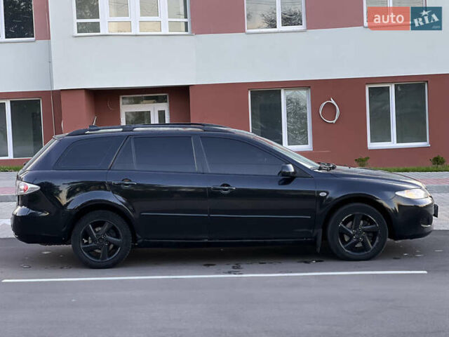 Чорний Мазда 6, об'ємом двигуна 2 л та пробігом 290 тис. км за 3200 $, фото 9 на Automoto.ua
