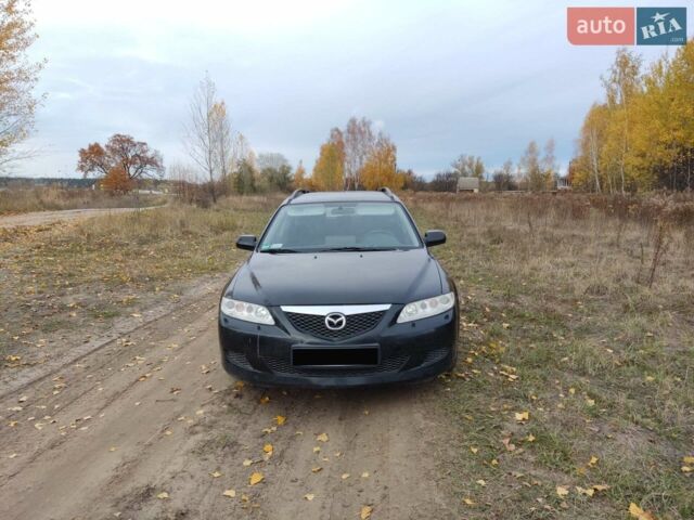 Черный Мазда 6, объемом двигателя 1.8 л и пробегом 269 тыс. км за 2900 $, фото 16 на Automoto.ua