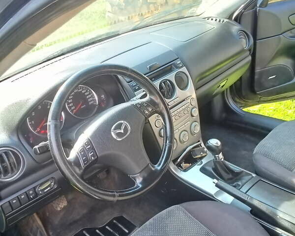 Черный Мазда 6, объемом двигателя 2 л и пробегом 249 тыс. км за 3500 $, фото 5 на Automoto.ua