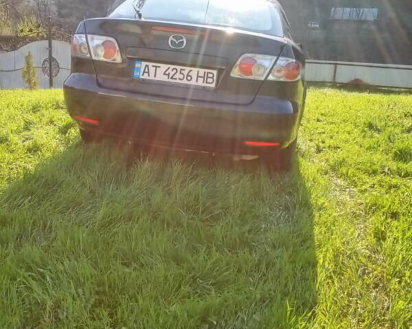 Черный Мазда 6, объемом двигателя 2 л и пробегом 249 тыс. км за 3500 $, фото 9 на Automoto.ua