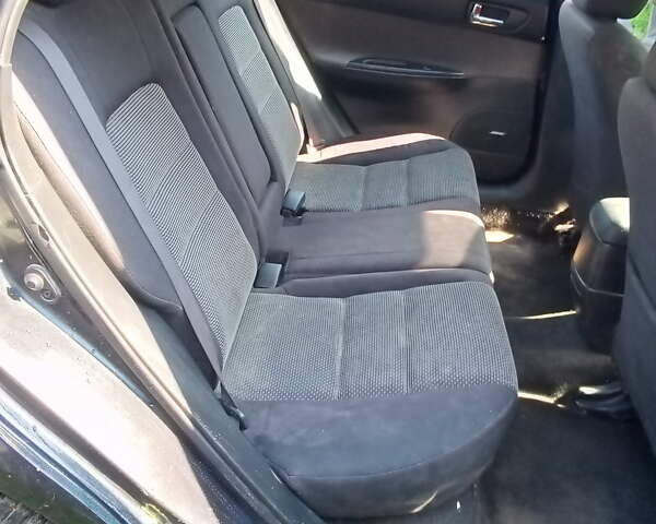 Черный Мазда 6, объемом двигателя 2 л и пробегом 249 тыс. км за 3500 $, фото 6 на Automoto.ua