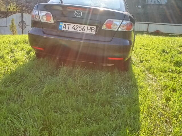 Чорний Мазда 6, об'ємом двигуна 2 л та пробігом 249 тис. км за 3500 $, фото 9 на Automoto.ua