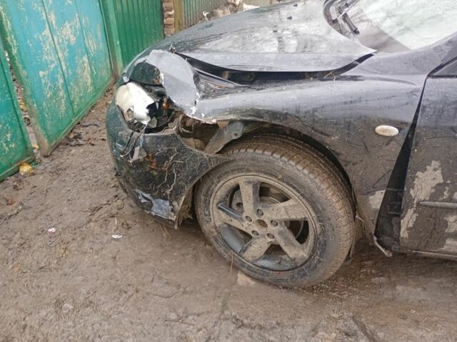 Чорний Мазда 6, об'ємом двигуна 2 л та пробігом 298 тис. км за 2000 $, фото 1 на Automoto.ua