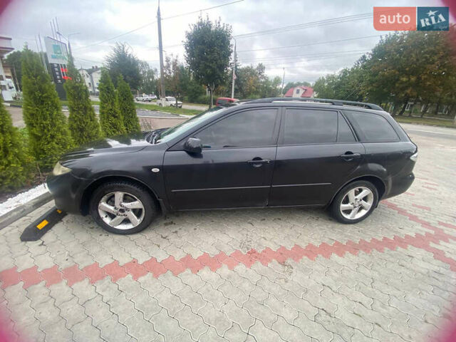 Черный Мазда 6, объемом двигателя 2 л и пробегом 370 тыс. км за 3300 $, фото 3 на Automoto.ua