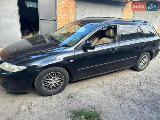 Чорний Мазда 6, об'ємом двигуна 2 л та пробігом 209 тис. км за 2350 $, фото 1 на Automoto.ua