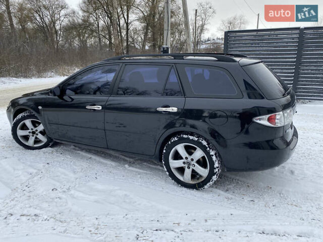 Чорний Мазда 6, об'ємом двигуна 2.3 л та пробігом 290 тис. км за 4500 $, фото 6 на Automoto.ua
