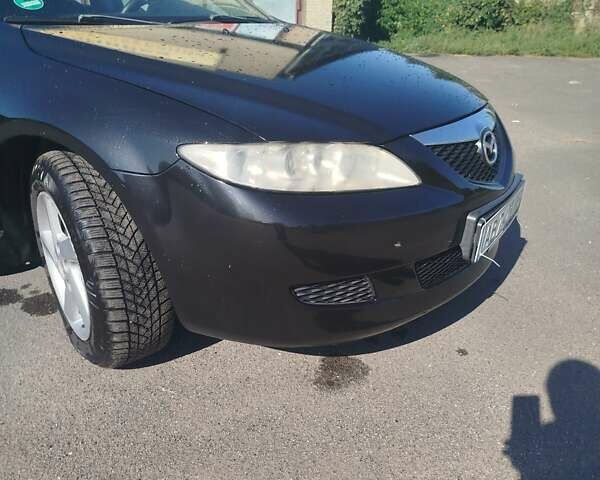 Черный Мазда 6, объемом двигателя 2 л и пробегом 300 тыс. км за 4300 $, фото 6 на Automoto.ua