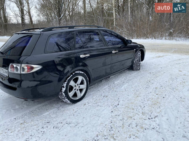 Чорний Мазда 6, об'ємом двигуна 2.3 л та пробігом 290 тис. км за 4500 $, фото 5 на Automoto.ua