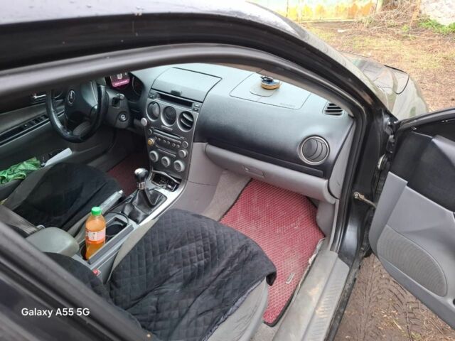 Черный Мазда 6, объемом двигателя 2 л и пробегом 362 тыс. км за 2601 $, фото 5 на Automoto.ua