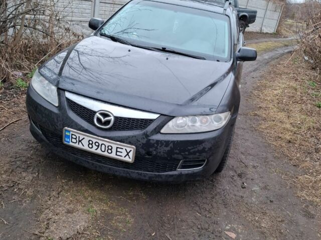 Черный Мазда 6, объемом двигателя 2 л и пробегом 362 тыс. км за 2601 $, фото 2 на Automoto.ua