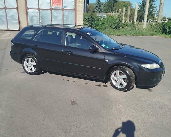 Черный Мазда 6, объемом двигателя 2 л и пробегом 300 тыс. км за 4300 $, фото 2 на Automoto.ua