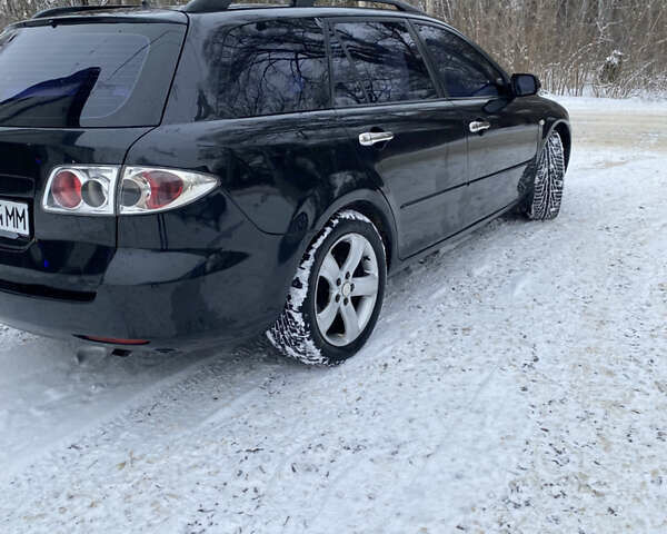 Чорний Мазда 6, об'ємом двигуна 2.3 л та пробігом 290 тис. км за 4500 $, фото 4 на Automoto.ua