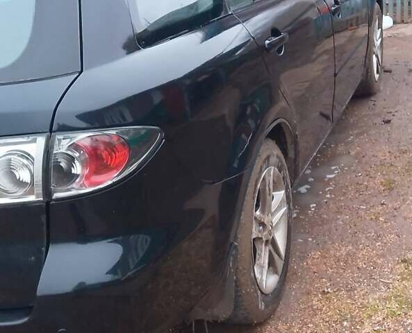 Черный Мазда 6, объемом двигателя 2 л и пробегом 377 тыс. км за 2400 $, фото 2 на Automoto.ua