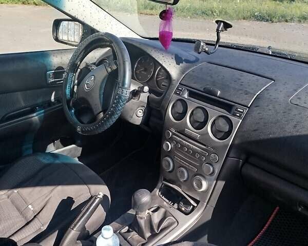 Черный Мазда 6, объемом двигателя 2 л и пробегом 300 тыс. км за 4300 $, фото 4 на Automoto.ua