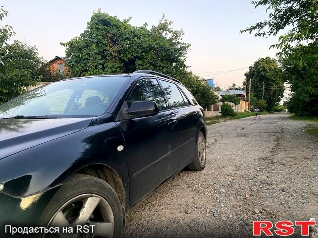 Чорний Мазда 6, об'ємом двигуна 2 л та пробігом 255 тис. км за 2600 $, фото 5 на Automoto.ua