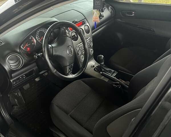 Черный Мазда 6, объемом двигателя 1.8 л и пробегом 173 тыс. км за 4200 $, фото 7 на Automoto.ua